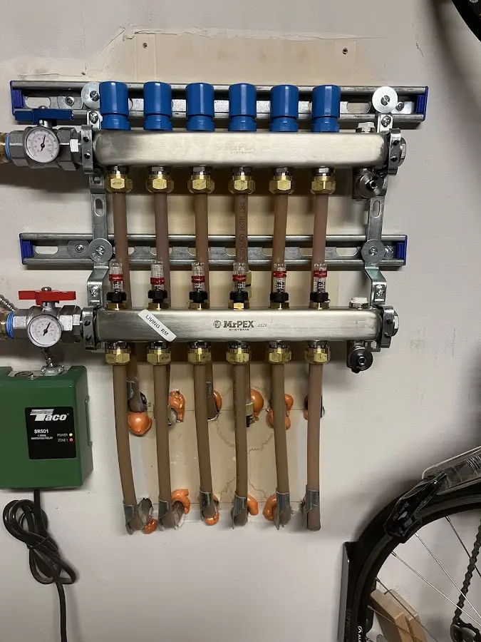 Plumber performing Gas Line Installation at a residential property in Newport